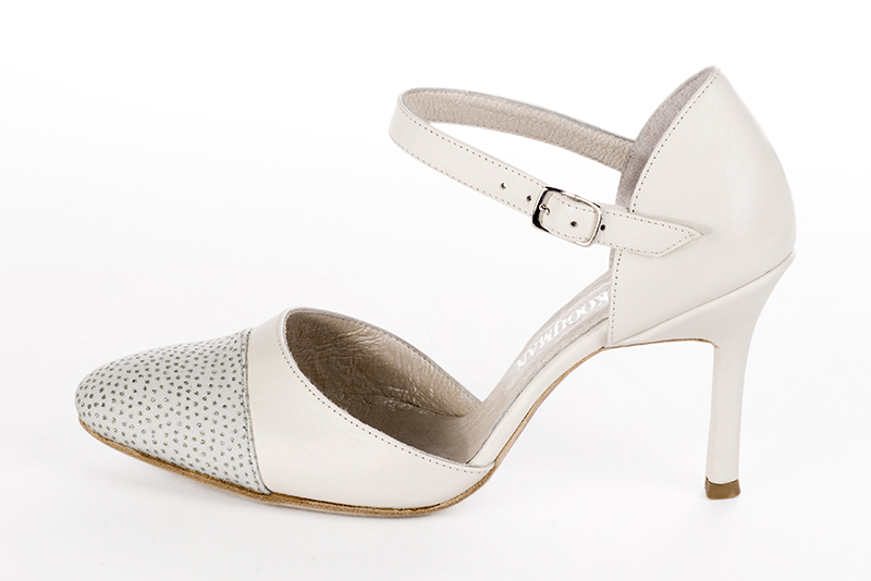 Light silver and off white women's open side shoes, with an instep strap. Round toe. Very high slim heel. Profile view - Florence KOOIJMAN